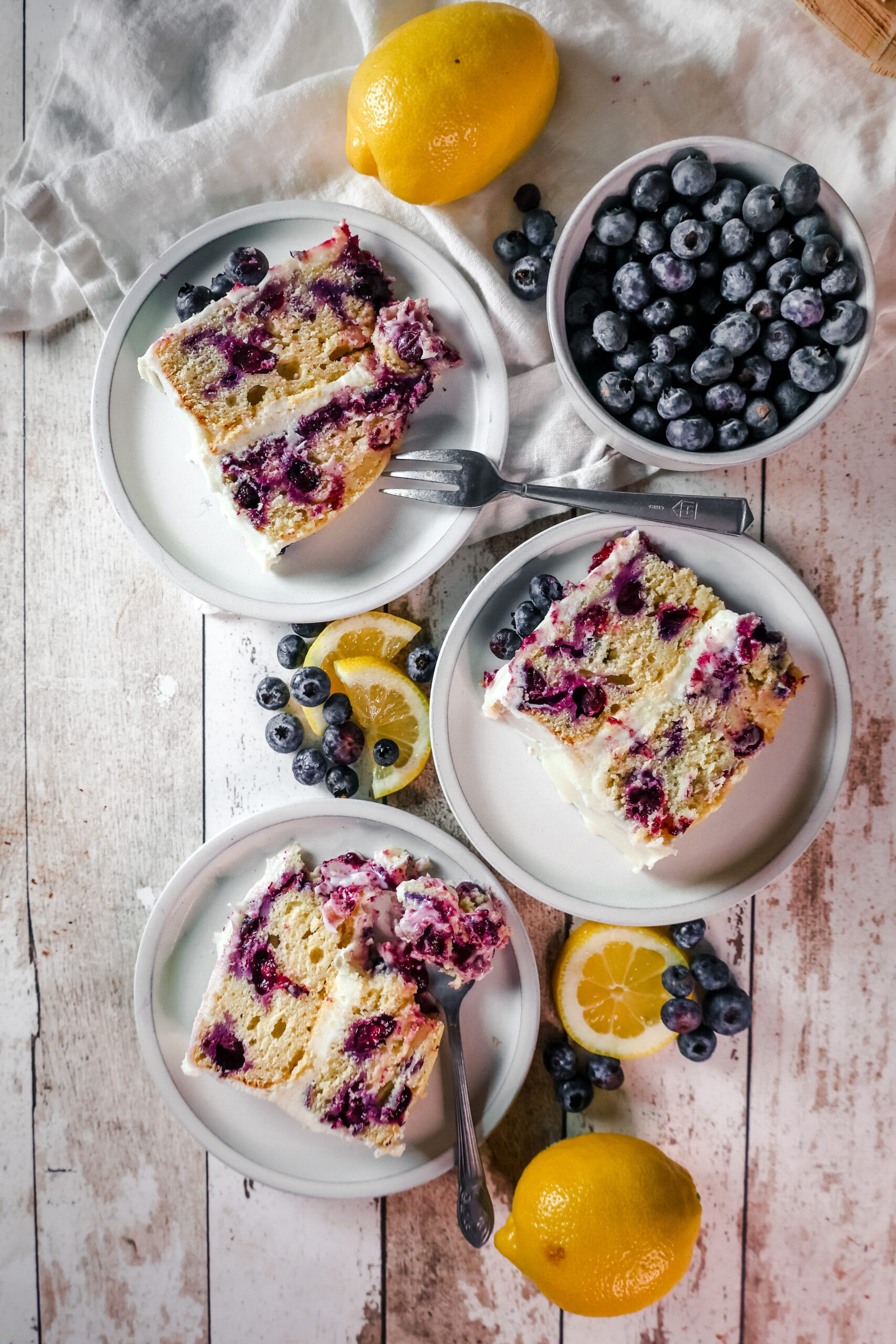 overhead view of slices of lemon blueberry cake