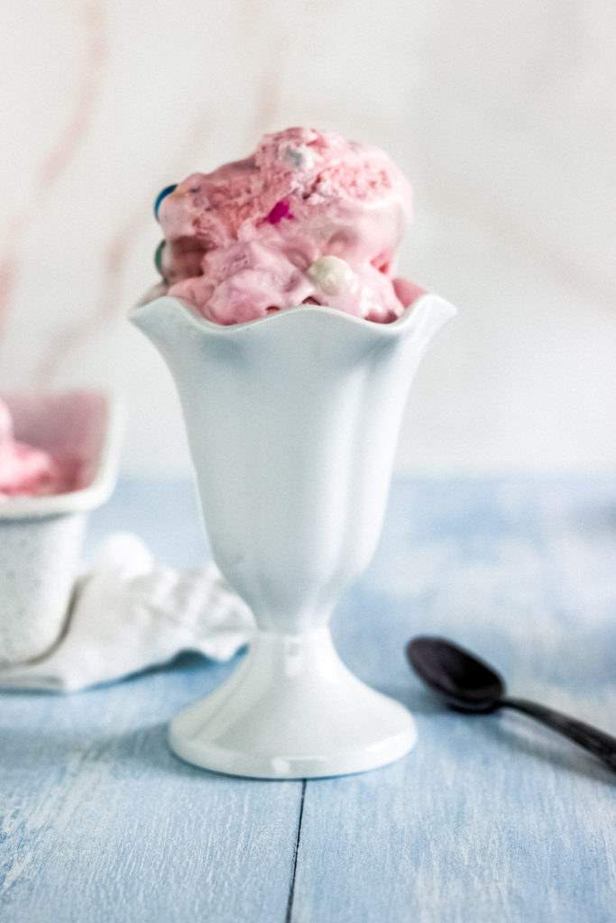pink bubblegum ice cream recipe scooped into a sundae cup