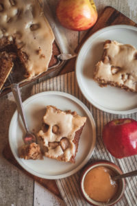 overtop view of a piece of caramel apple sheet cake