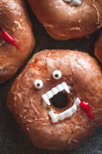 overhead view of a vampire donut for halloween