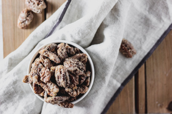 a bowl of candied pecans made in the oven