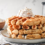 easy eggnog waffles on a plate