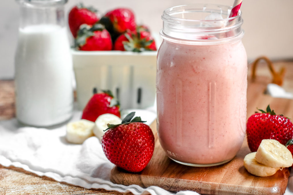 straight on view of a creamy strawberry smoothie