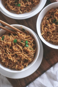 overhead view of a bowl filled with peanut butter noodles