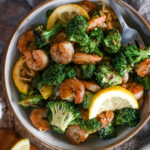 overhead view of a plate of garlic butter shrimp and broccoli