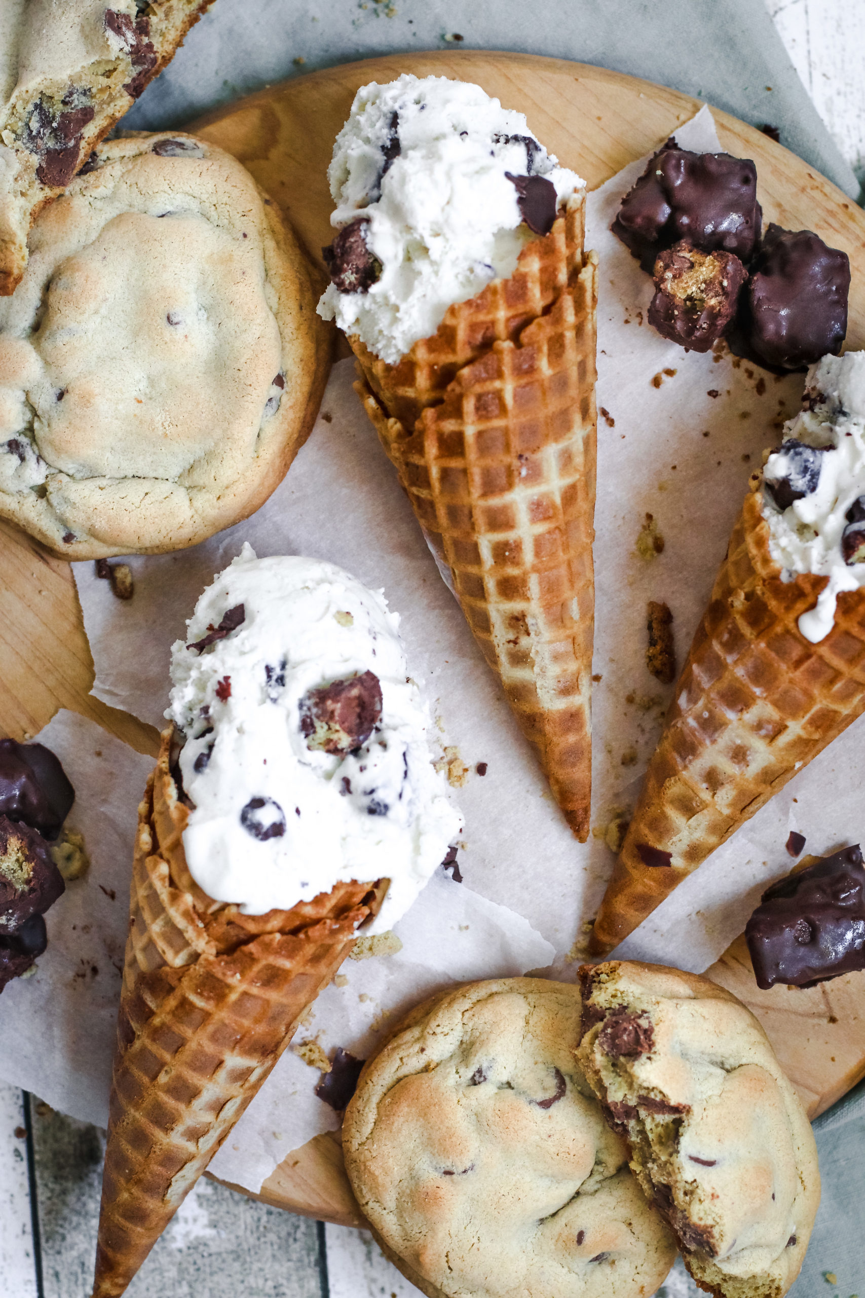 overhead view of a cone of ice cream filled with chocolate covered cookies