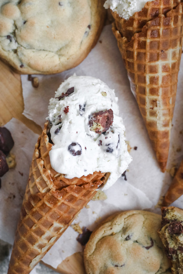 overhead view of a cone of ice cream filled with chocolate covered cookies