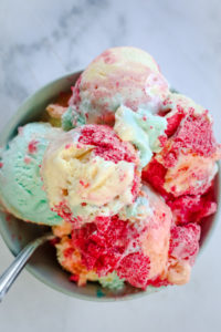 Overhead view of a bowl of rainbow colored ice cream