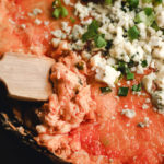 overhead shot of a pan of buffalo chicken dip