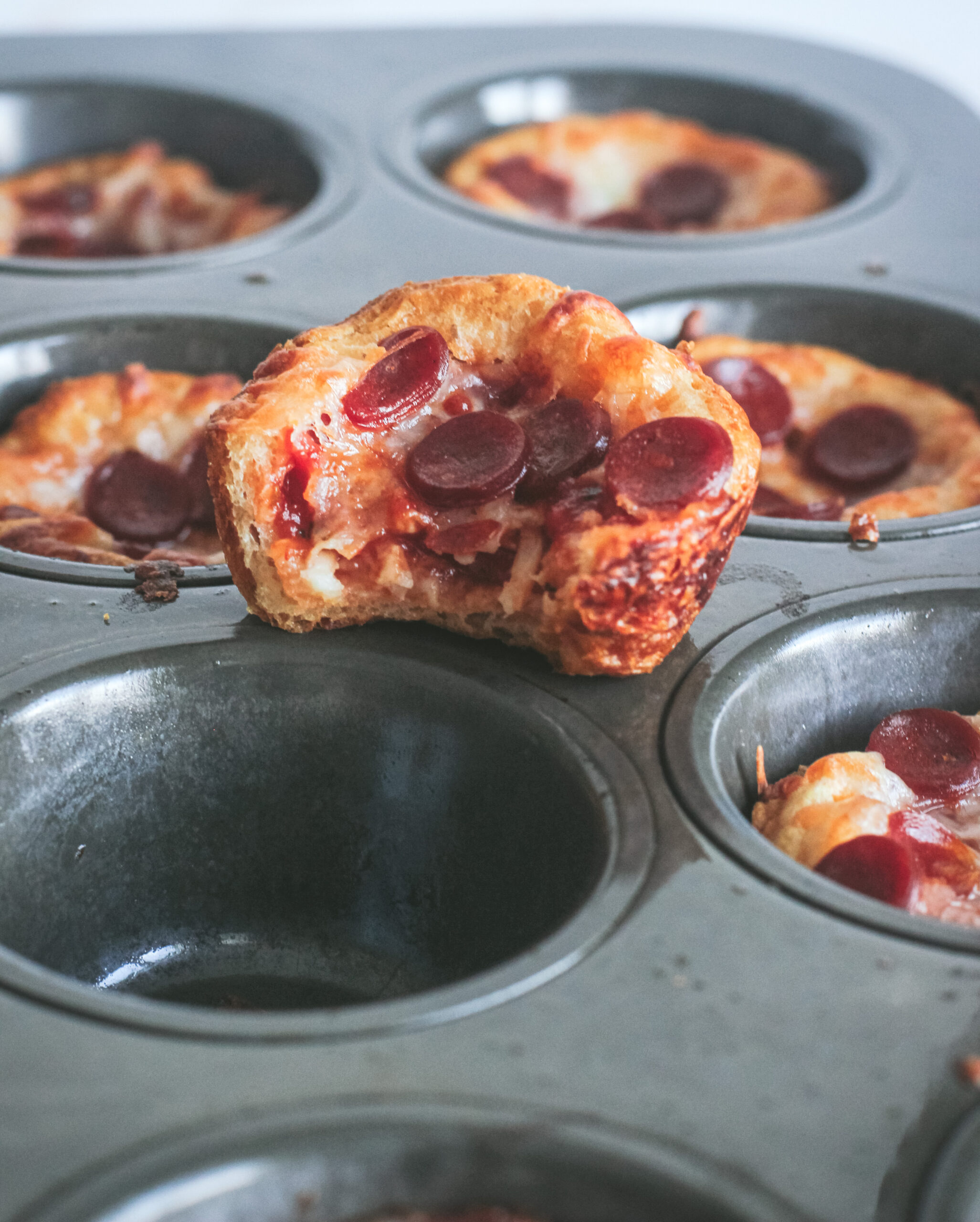 front view of easy pizza cups filled with pepperoni and cheese