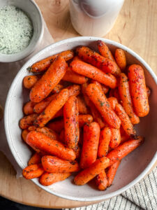 overhead shot of a bowl of roasted ranch carrots
