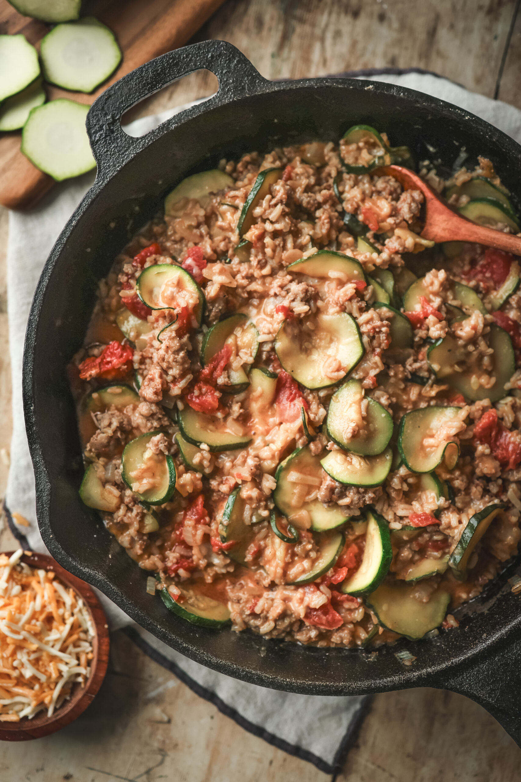 Overhead view of a skillet filled with the Zucchini and Sausage Mixture