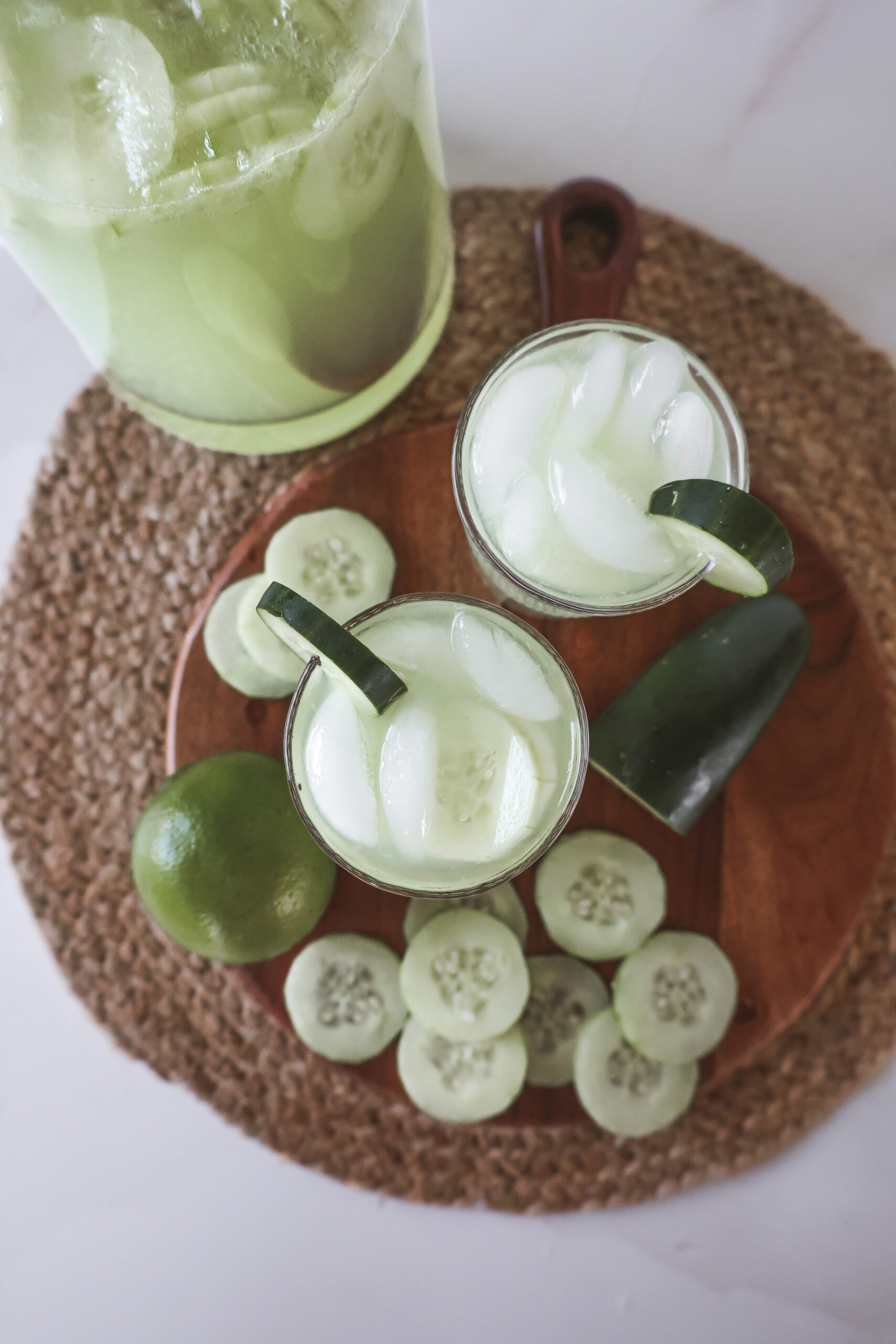 Overhead view of a glass of cucumber lime punch