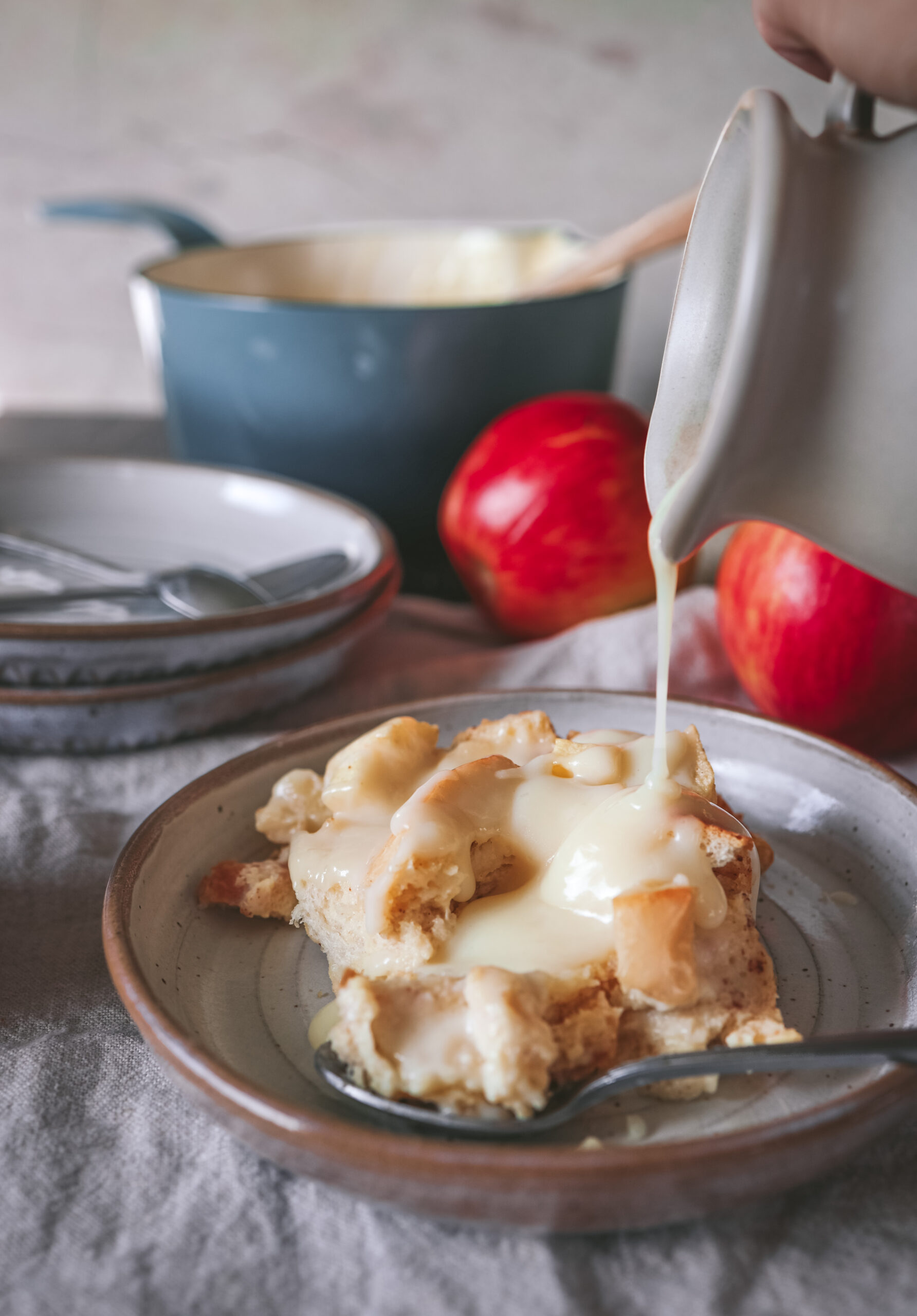 Eggnog Apple Bread Pudding with Creamy Eggnog Sauce