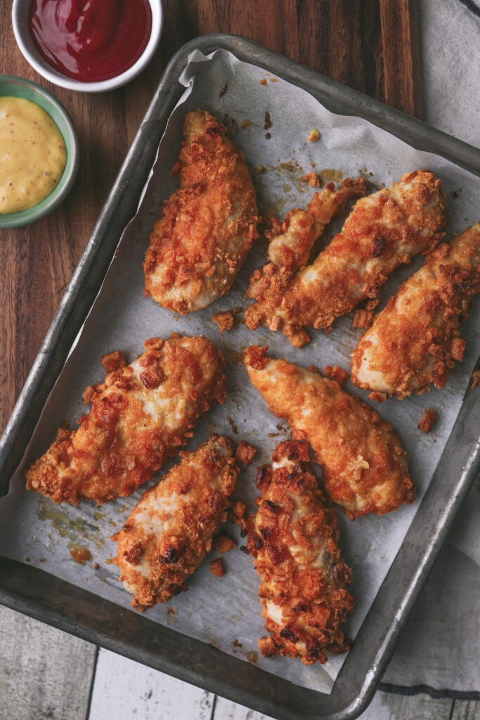 Chicken tenders coated with Cap'n Crunch Cereal