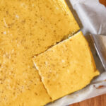 Meal prep sheet pan eggs cut into squares for quick breakfast
