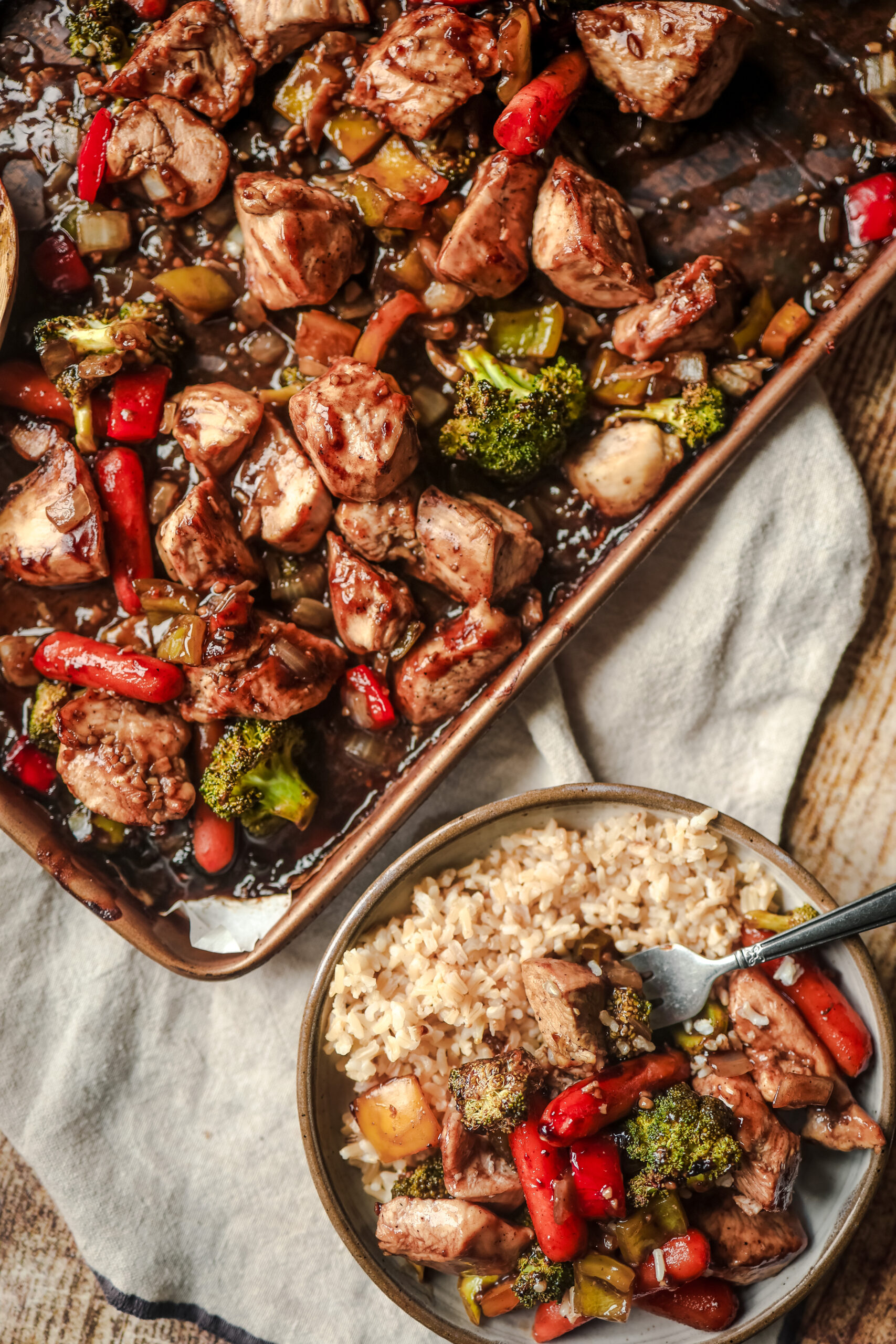 Easy sheet pan dinner served over white rice