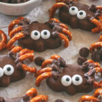 Make these cute and spooky Reese’s Peanut Butter Cup Spiders for Halloween! An easy no-bake recipe with candy eyes, pretzels, and peanut butter cups—perfect for parties or kids’ treats