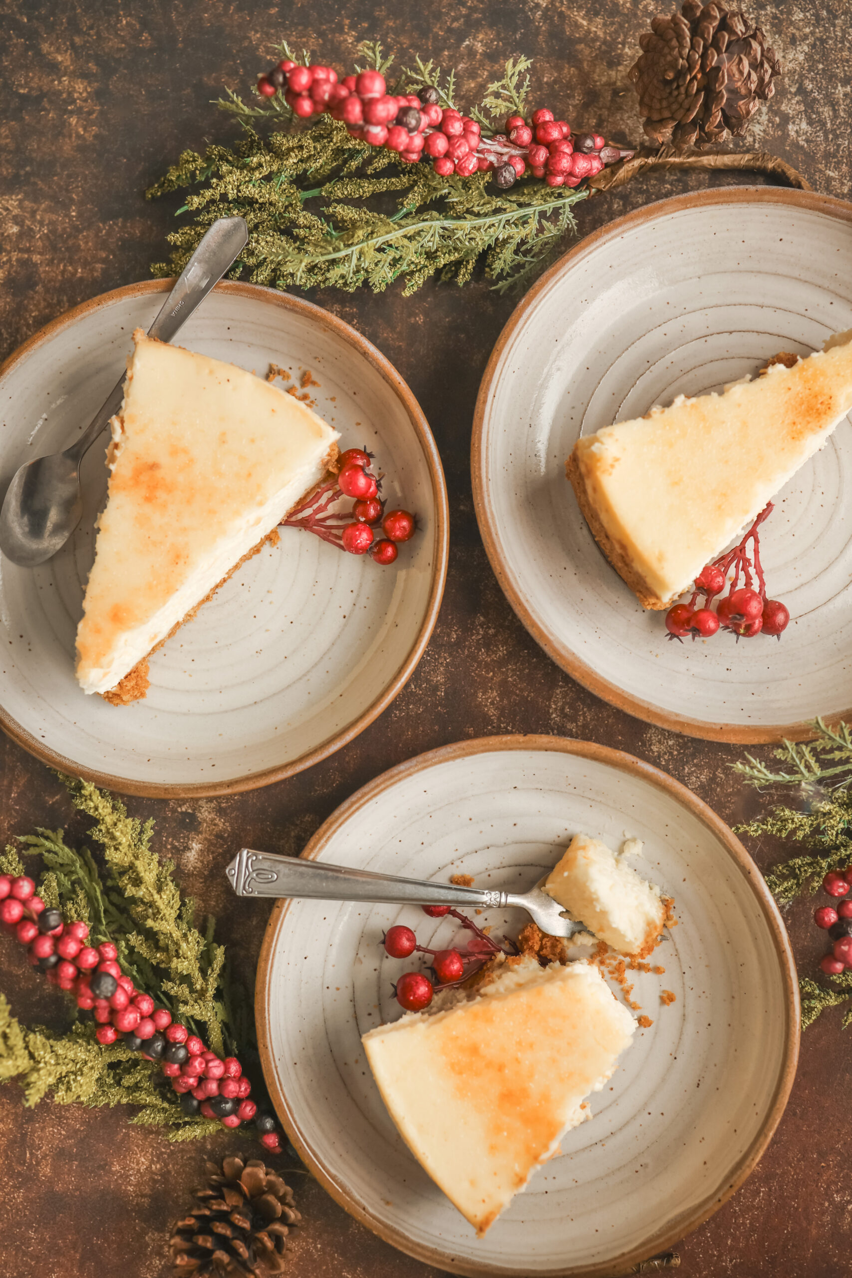 Overhead look at slices of creme brulee cheesecake with a toasted sugar topping