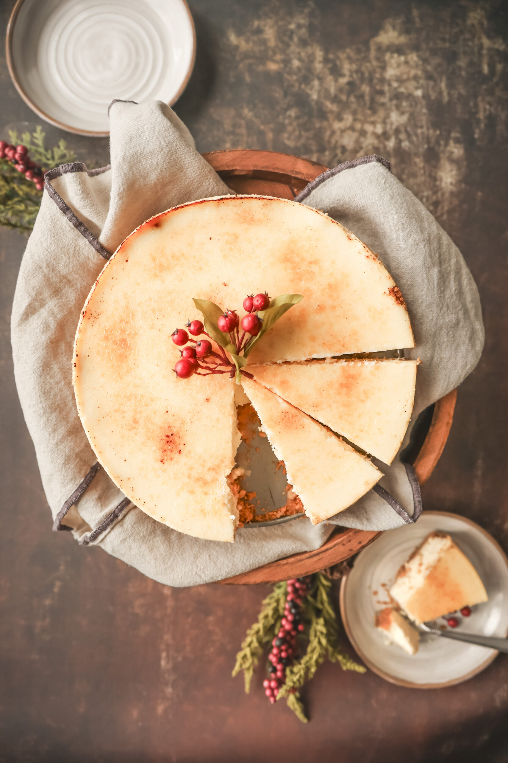 Overhead look at slices of creme brulee cheesecake with a toasted sugar topping