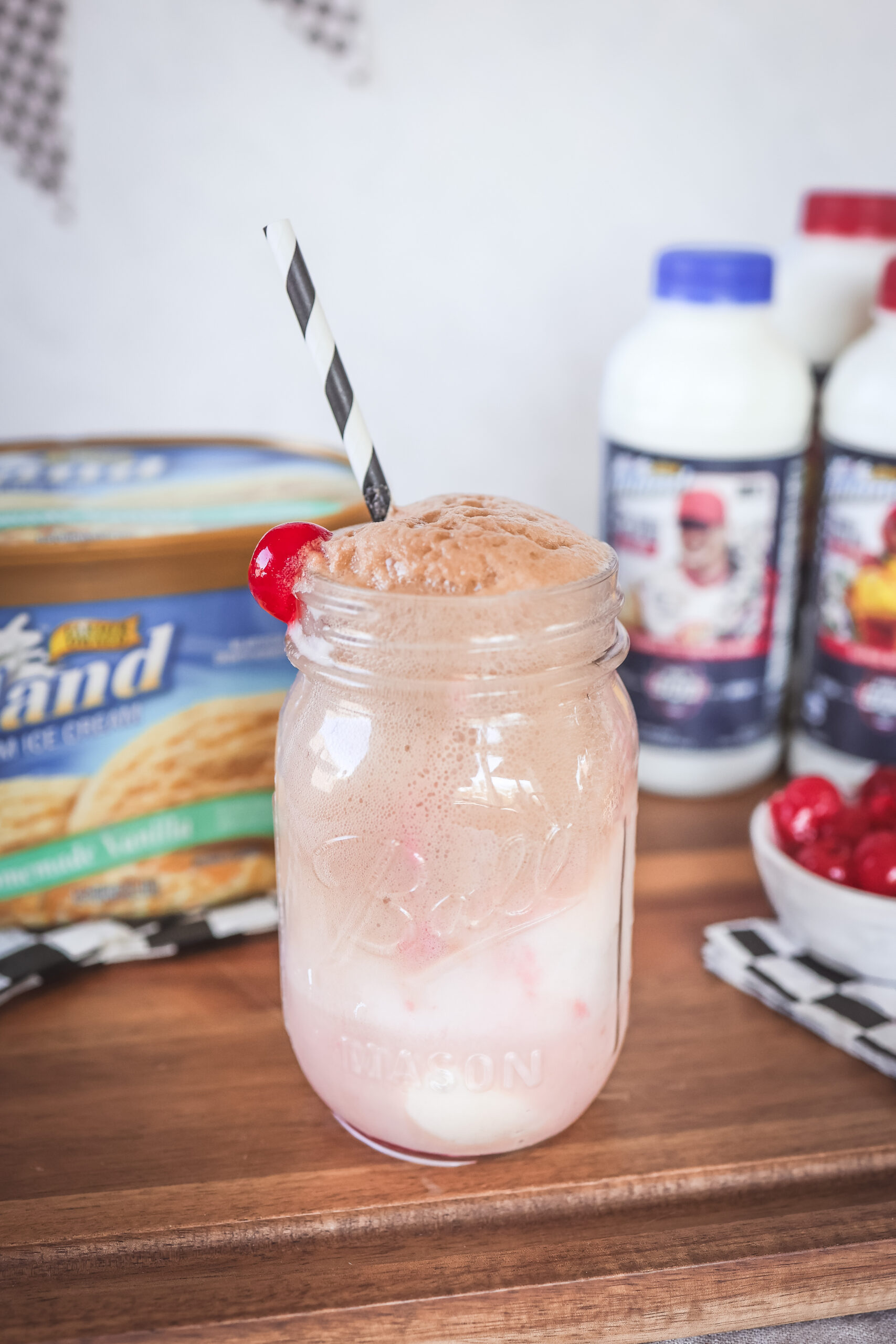 Straight on shot of a cherry cola ice cream float