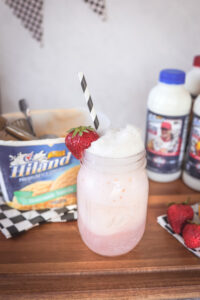 Straight on shot of a strawberry lemonade ice cream float