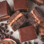 Layered peanut butter brownies with rich chocolate frosting on top