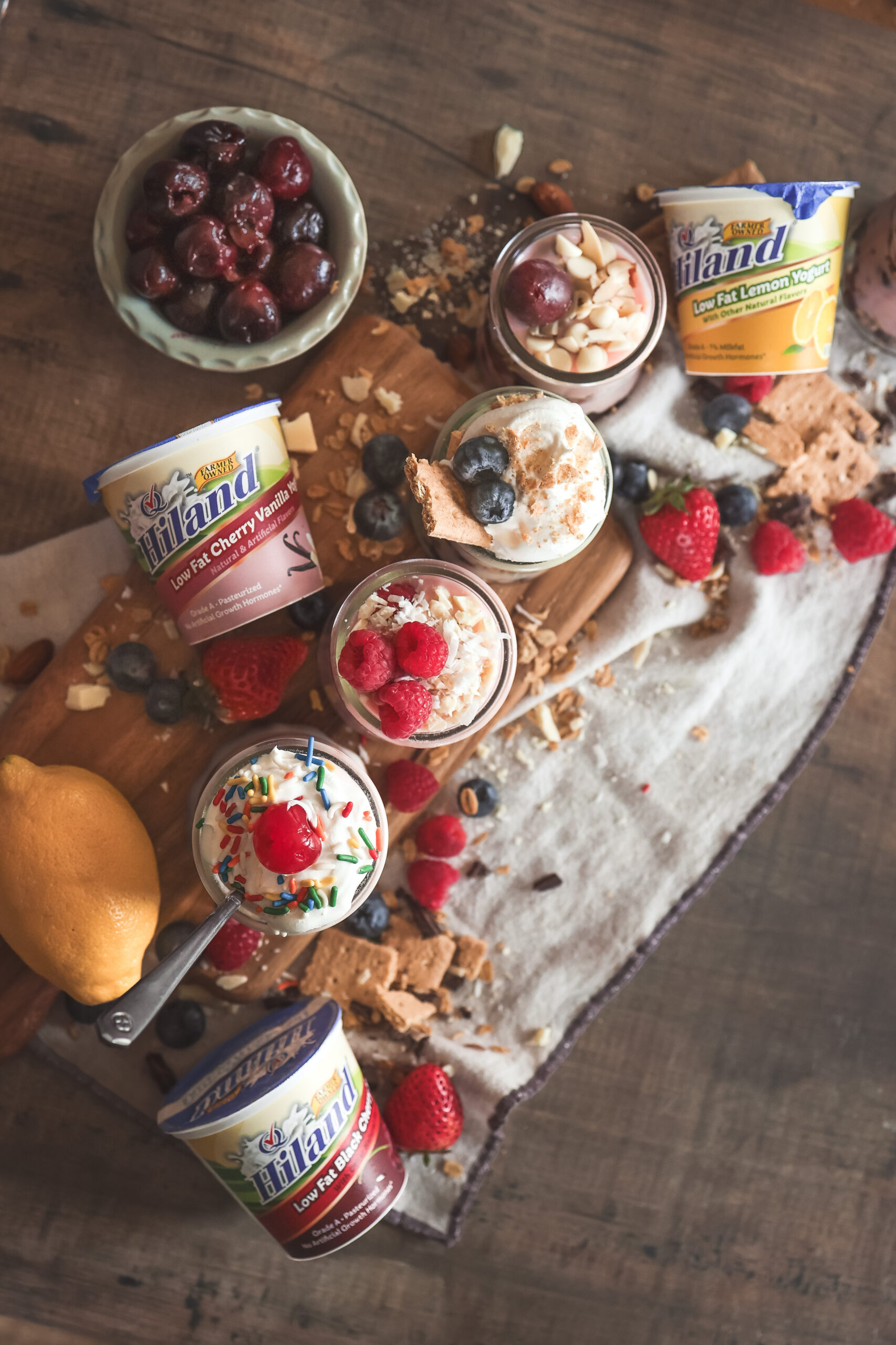 Easy yogurt parfait ideas with fruit, chocolate, and granola in five different flavor combinations