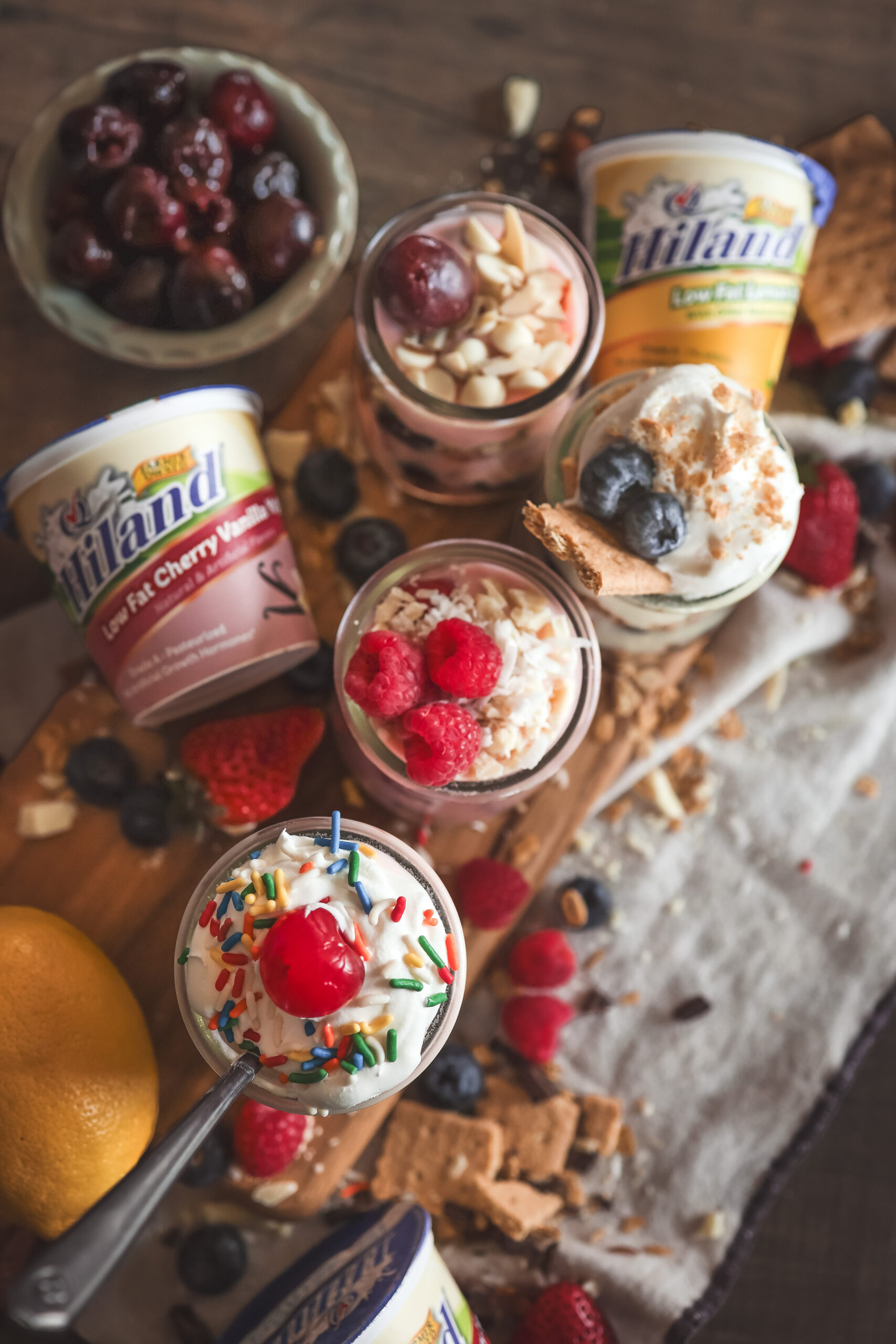 Easy yogurt parfait ideas with fruit, chocolate, and granola in five different flavor combinations