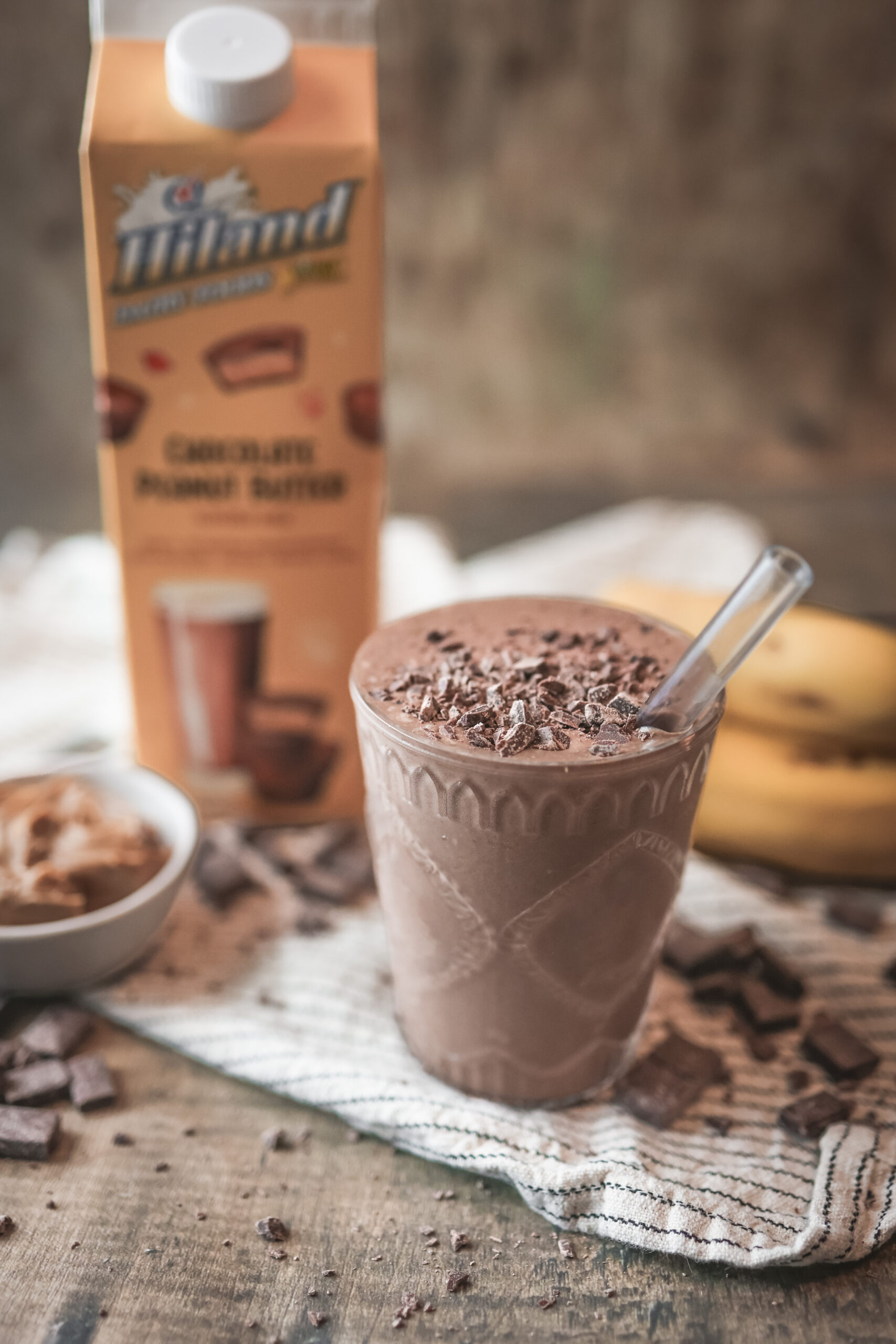 Close-up of a creamy chocolate peanut butter smoothie with rich chocolate color.