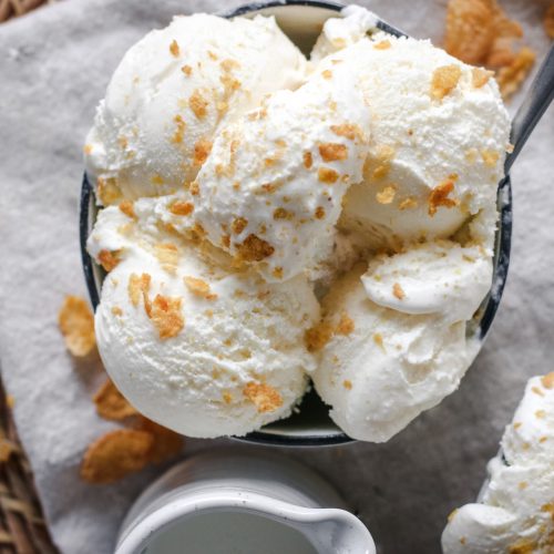 overhead view of two bowls of cereal milk ice cream