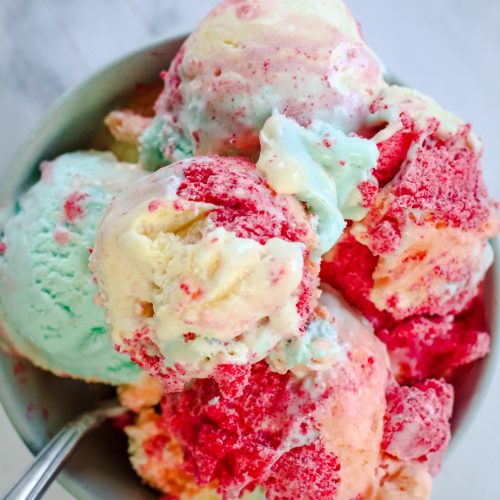 Overhead view of a bowl of rainbow colored ice cream