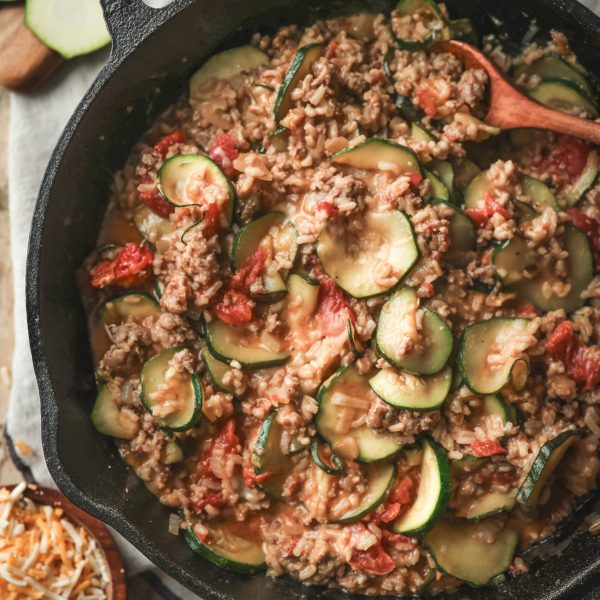 Overhead view of a skillet filled with the Zucchini and Sausage Mixture